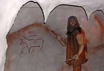 Peintre de la préhistoire dans les grottes