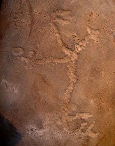 Gravure humaine dite de l'Homme en Rût, trouvée dans la grotte de Lapo do Santo au Brésil. Datation - 10 000 ans