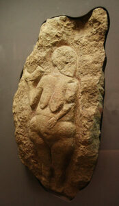 Vénus de Laussel Femme à la corne Hominides